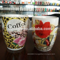 white porcelain coffee cup with custom designs